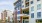 The entrance to the Icon Riverwalk apartments in Plainsboro, featuring a view of the building exterior and the street.