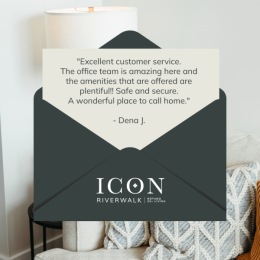a review of Icon Riverwalk with a picture of a living room behind it