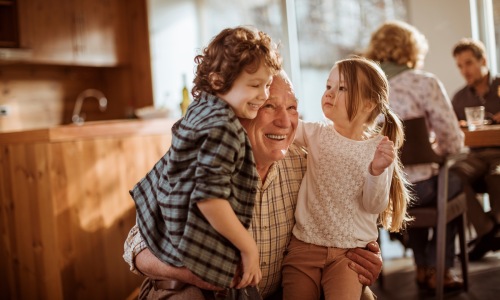 An old man with children