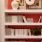 Detail of a model apartment at our senior living community in Plainsboro, NJ, featuring books on a shelf.